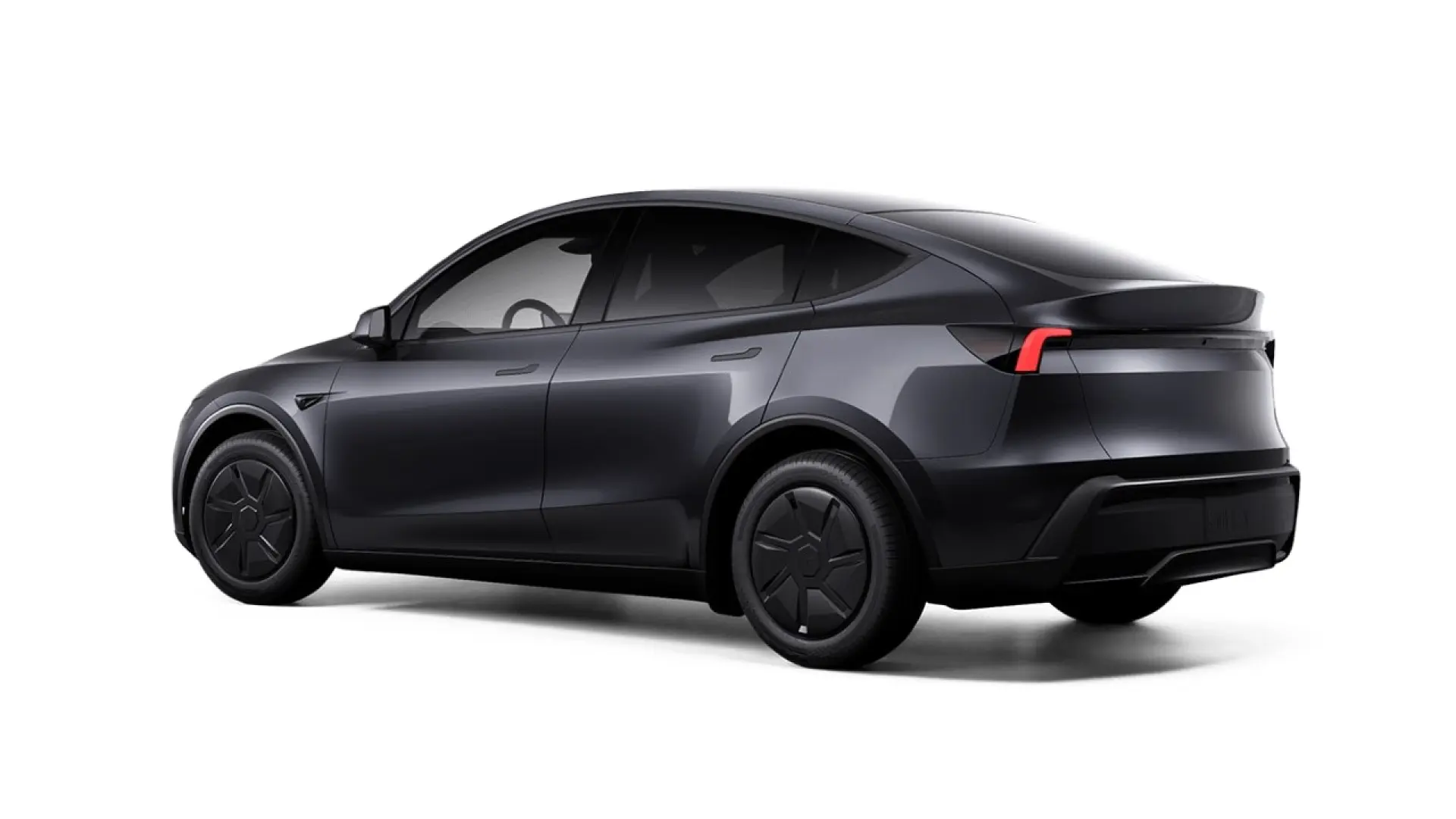 Tesla Model Y blanc garé en extérieur, vue de trois quarts avant montrant son design de SUV électrique